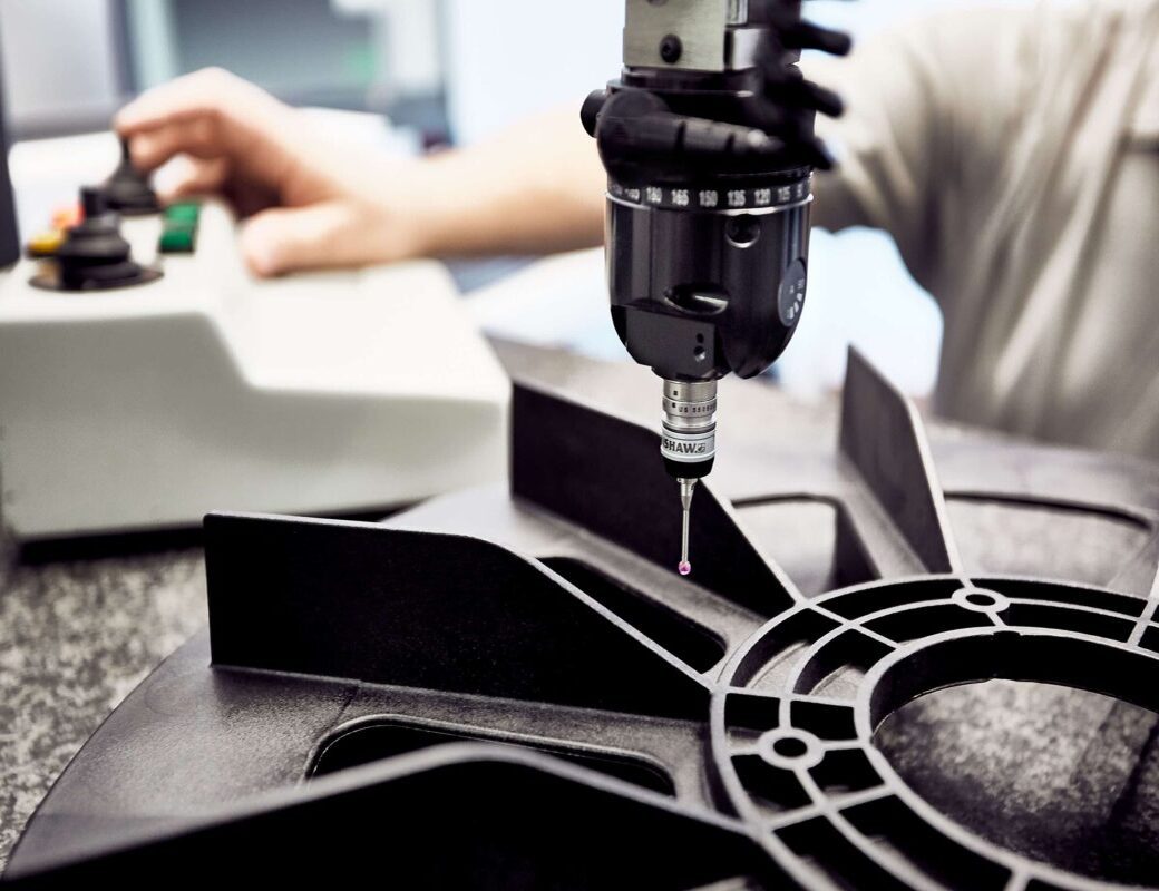 CNC precision finishing of a custom injection molded plastic component