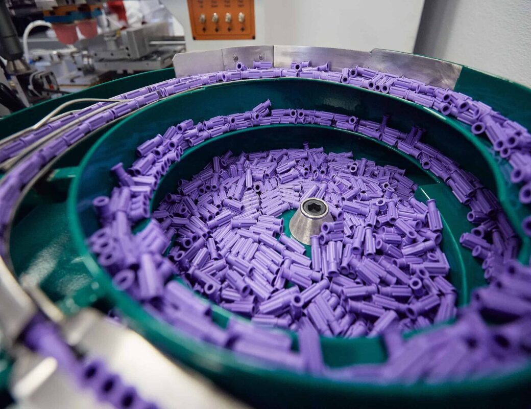 Engineering resin being processed for custom molded components