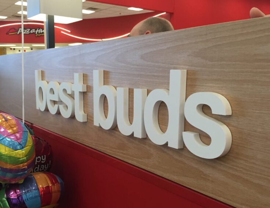 Fabricated and bonded acrylic retail display with dimensional lettering