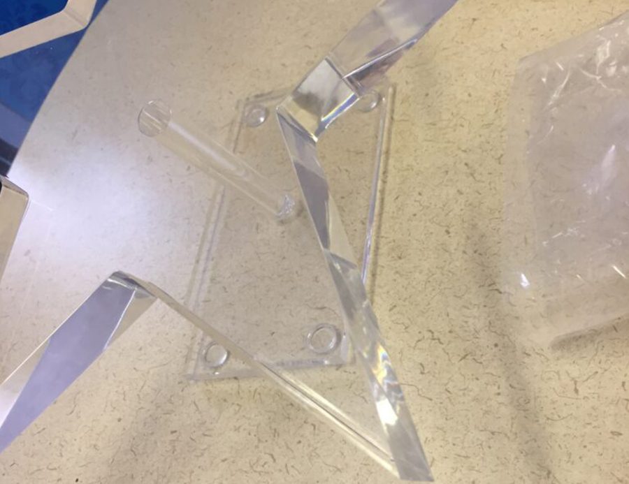 Machined and polished clear acrylic fabricated bracket