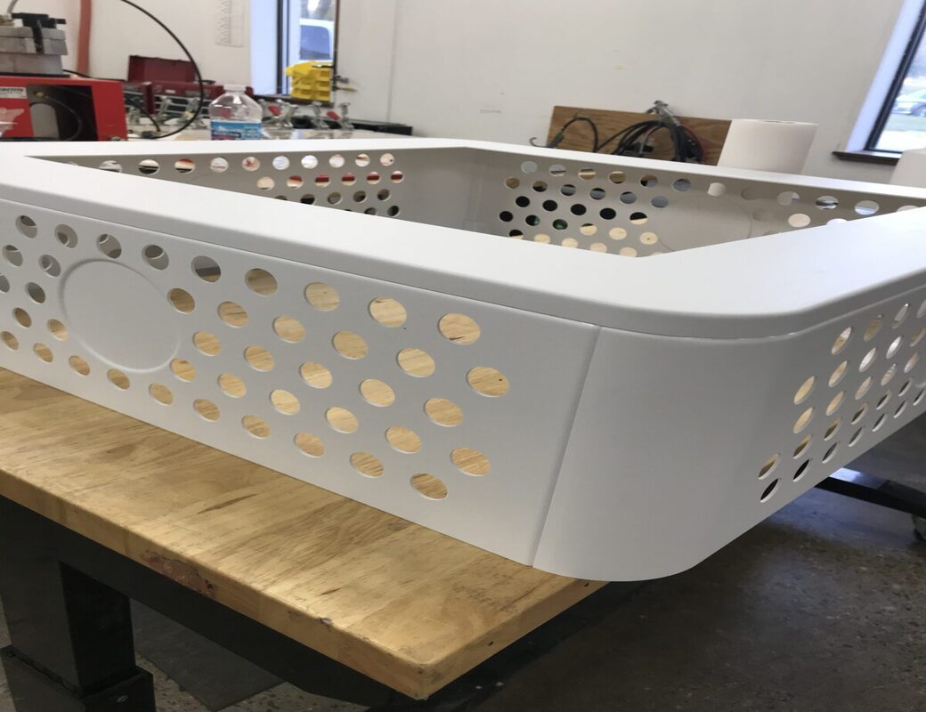 Thermoformed vented plastic tote produced from sheet stock