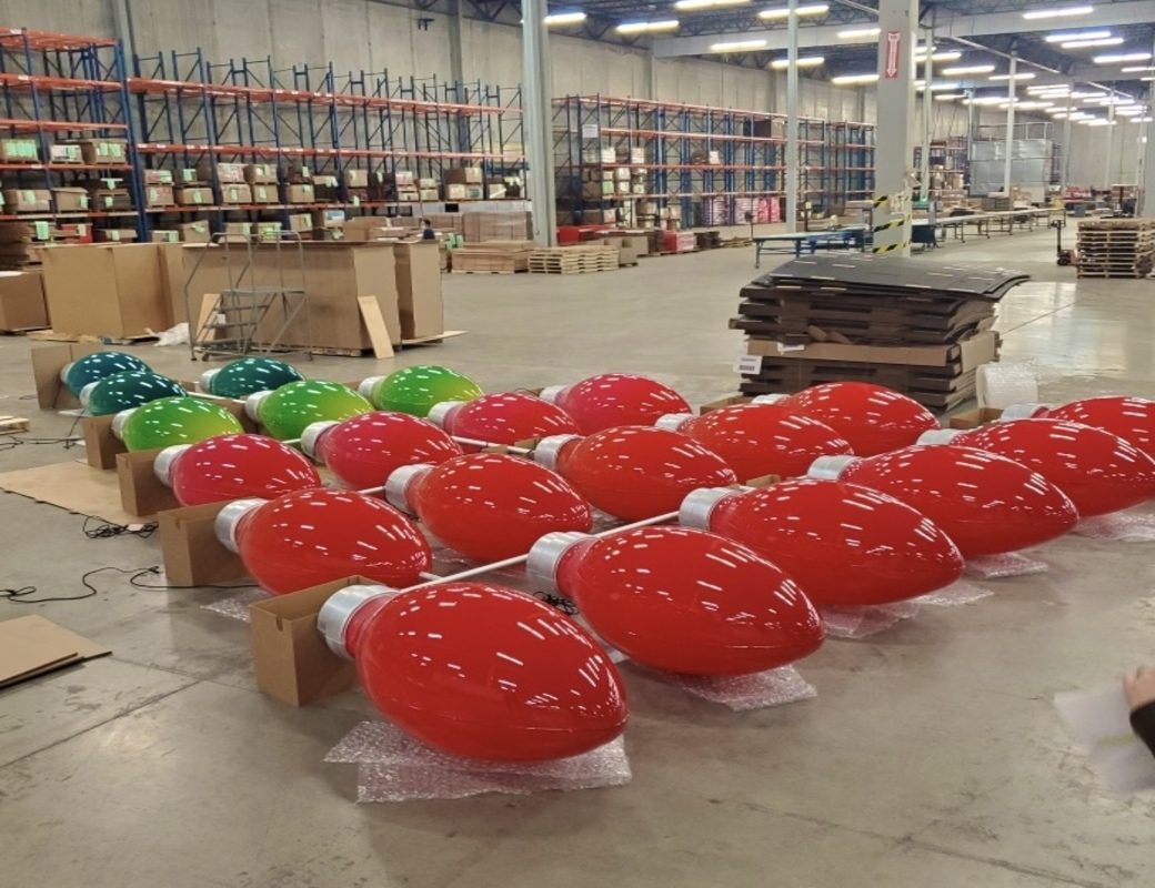 Batch of vacuum-formed plastic housings staged in the Plastic Alternatives facility
